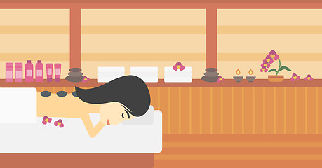 Image showing Woman getting stone therapy vector illustration.