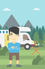 Image showing Man standing in front of motor home.