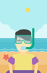 Image showing Man with snorkeling equipment on the beach.