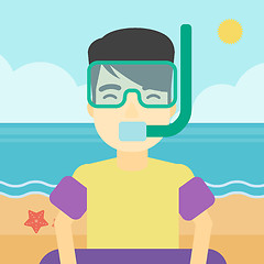 Image showing Man with snorkeling equipment on the beach.