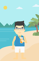 Image showing Man with cocktail on the beach.