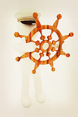 Image showing Sailor with wood steering wheel and earth. Trip around the world