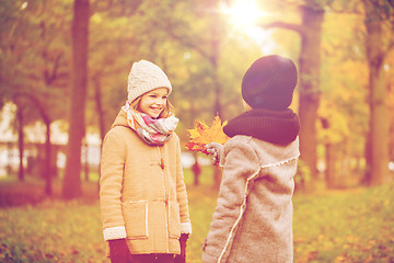 Image showing smiling children in autumn park