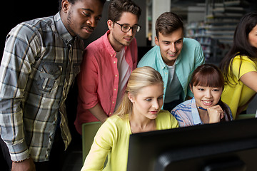 Image showing international students with computers at library