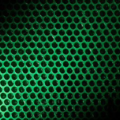 Image showing Bubble wrap lit by green light