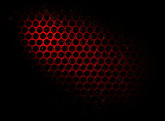 Image showing Bubble wrap lit by red light