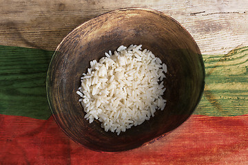 Image showing Poverty concept, bowl of rice with Bulgaria flag      