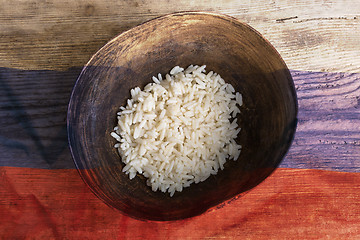 Image showing Poverty concept, bowl of rice with Russian flag      