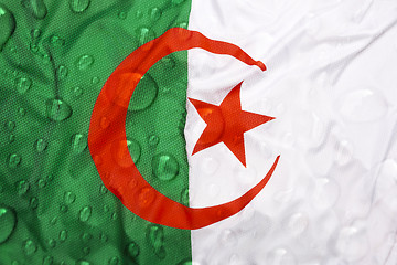 Image showing Flag of Algeria with rain drops
