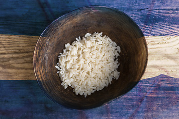 Image showing Poverty concept, bowl of rice with Honduras flag      