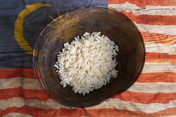 Image showing Poverty concept, bowl of rice with Malaysia flag      