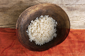 Image showing Poverty concept, bowl of rice with Polish flag      