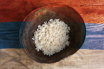 Image showing Poverty concept, bowl of rice with Serbian flag      