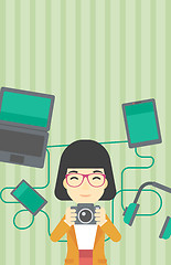 Image showing Woman surrounded with her gadgets.