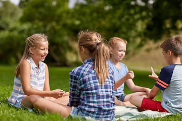 Image showing happy kids playing rock-paper-scissors game