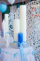 Image showing Blue and white candles