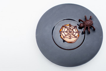 Image showing waffle with chocolate spider web