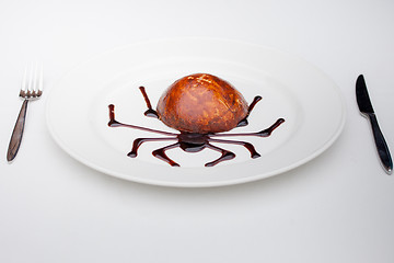 Image showing dessert with chocolate spider web