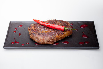 Image showing grilled steak with pepper