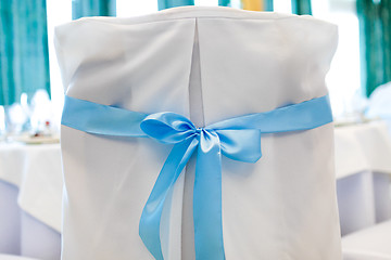 Image showing Chair, beautifully decorated with ribbon