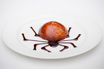 Image showing dessert with chocolate spider web