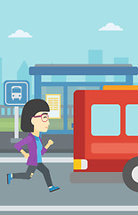 Image showing Latecomer woman running for the bus.