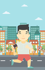 Image showing Man running with earphones and smartphone.