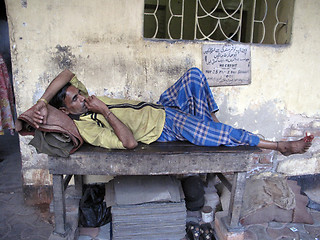 Image showing Streets of Kolkata, man sleeping on the streets