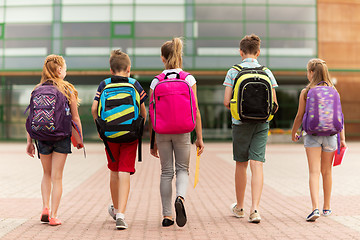 Image showing group of happy elementary school students walking