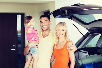 Image showing happy family with hatchback car at home parking