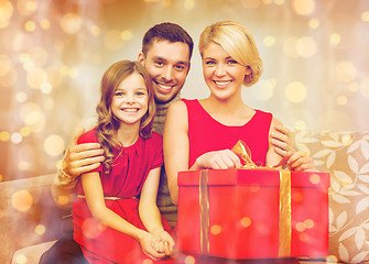 Image showing happy family opening gift box