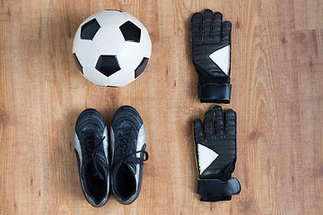 Image showing close up of soccer ball, boots and gloves