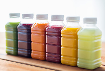 Image showing bottles with different fruit or vegetable juices