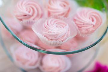 Image showing close up of custard sweets on glass serving tray