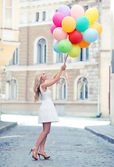 Image showing woman with colorful balloons