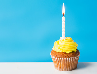 Image showing birthday cupcake with one burning candle