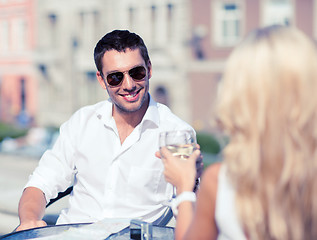 Image showing couple drinking wine in cafe