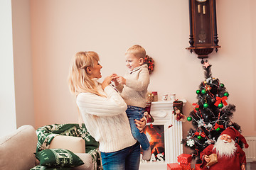 Image showing Happy family at christmas time