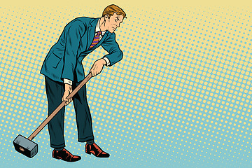 Image showing Retro businessman with a big hammer, copy space right