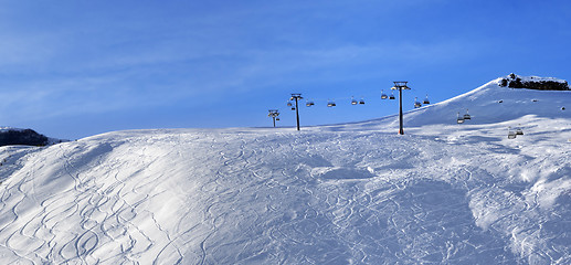 Image showing Panoramic view on sunlight off-piste slope at morning