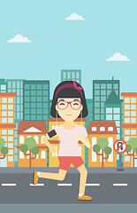 Image showing Woman running with earphones and smartphone.