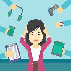 Image showing Woman surrounded with her gadgets.