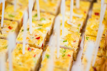 Image showing close up of served casserole or quiche pieces