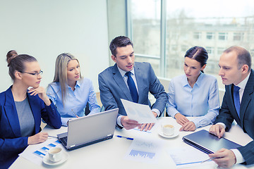 Image showing business team with laptop having discussion