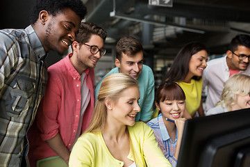 Image showing international students with computers at library