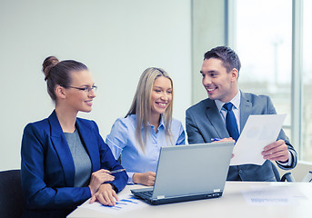 Image showing business team with laptop having discussion