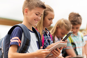 Image showing group of happy elementary school students talking