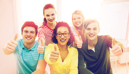 Image showing smiling students at school showing thumbs up