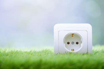 Image showing Electric outlet in the grass