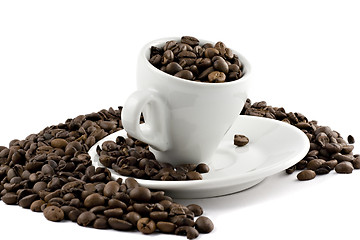 Image showing coffee cup with beans isolated on white